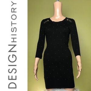DESIGN HISTORY black dress with gold accents